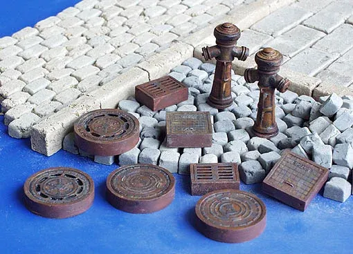 Resinové díly Plus Model 143 kanalizační poklopy v měřítku 1/35 pro diorámata