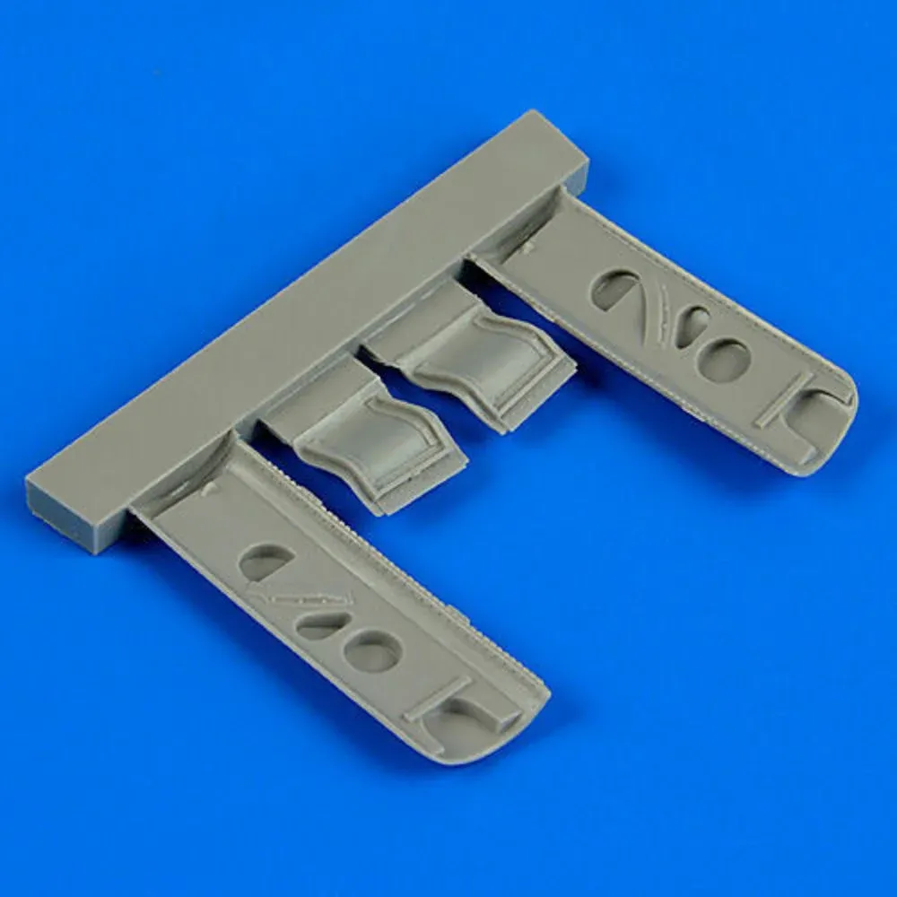 Resinové kryty podvozku Quickboost QB32160 pro P-40E Warhawk v měřítku 1/32