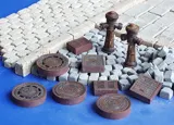 Resinové díly Plus Model 143 kanalizační poklopy v měřítku 1/35 pro diorámata